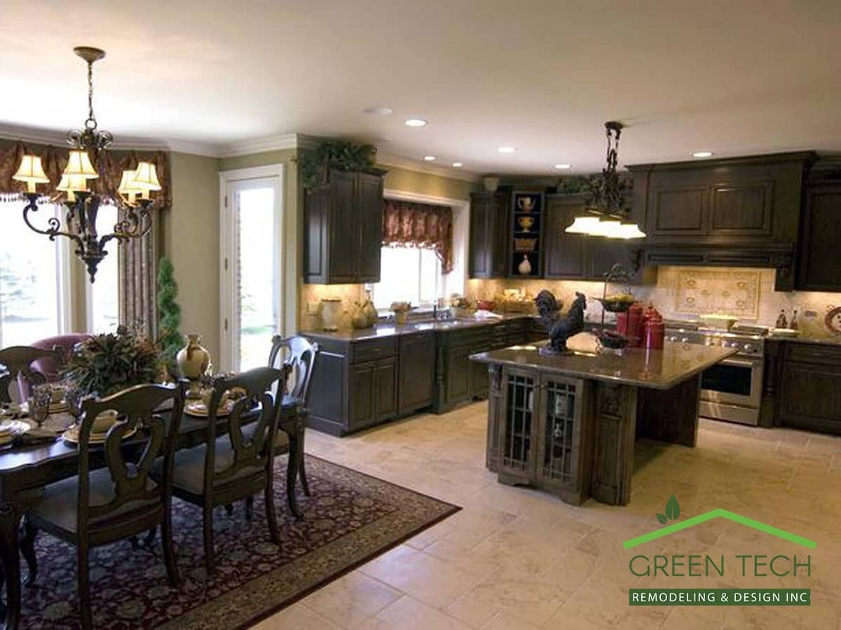 Luxury open-concept kitchen and dining room with custom cabinetry and pendant lighting