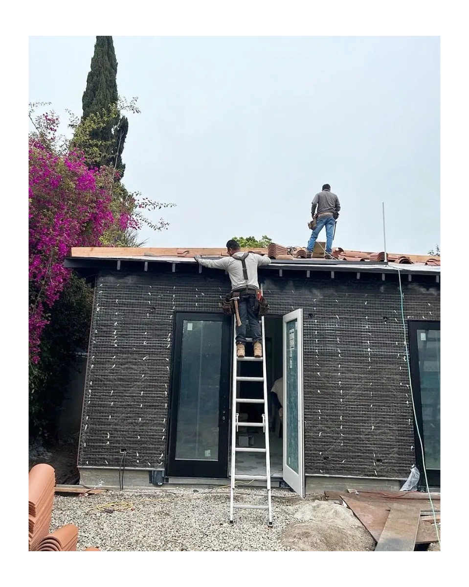 Green Tech crew installing a clay-tile roof and lath on an ADU